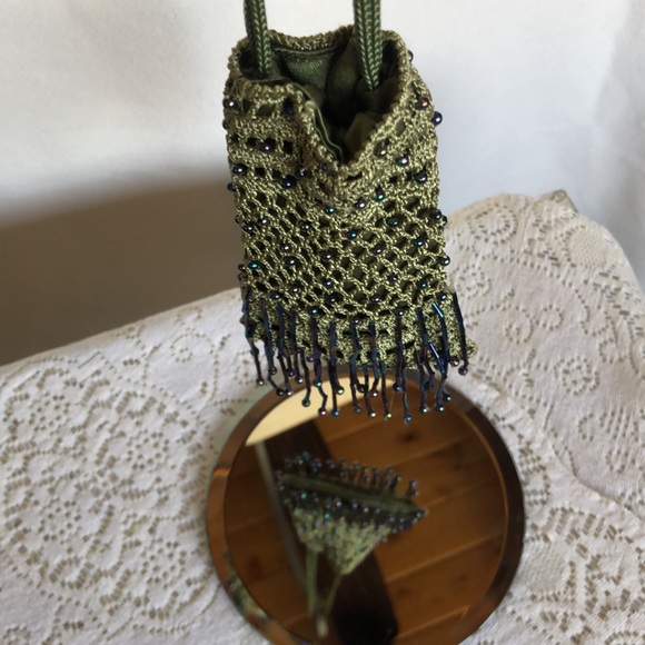 Crocheted and beaded tiny purse, cinch top…green and purple tones…lined in green - Picture 6 of 7